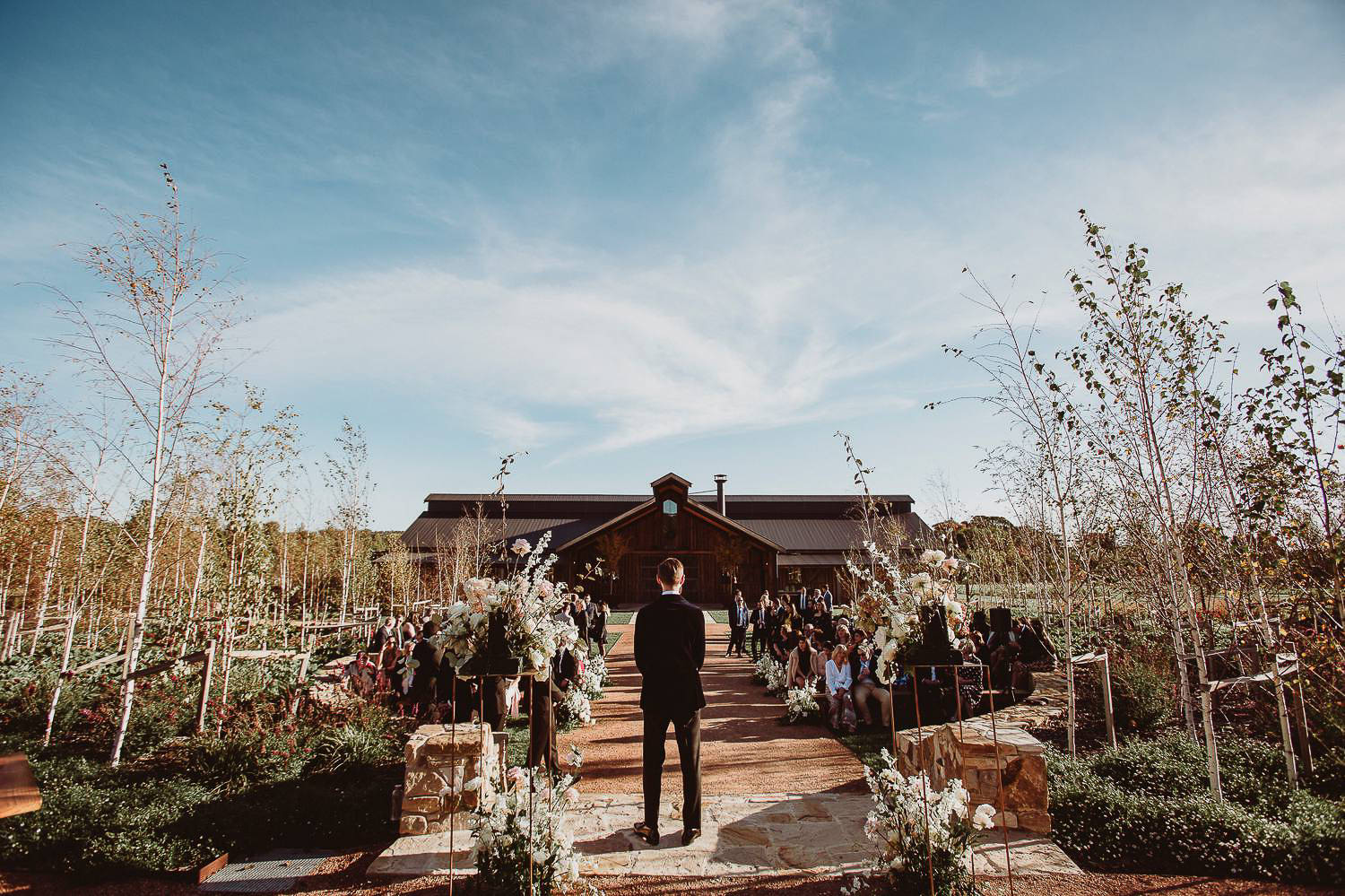 groom waiting at ceremony at bendooley estate